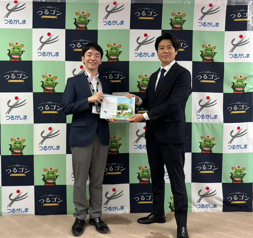 左：鶴ヶ島市長 小川 尋海(おがわ ひろみ)氏／右：株式会社タミヤホーム 代表取締役社長 田宮 明彦