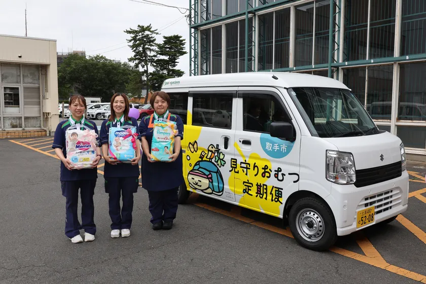配達ラッピングカーと見守り支援員